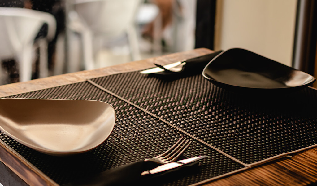 table-prepared-for-customers-in-restaurant